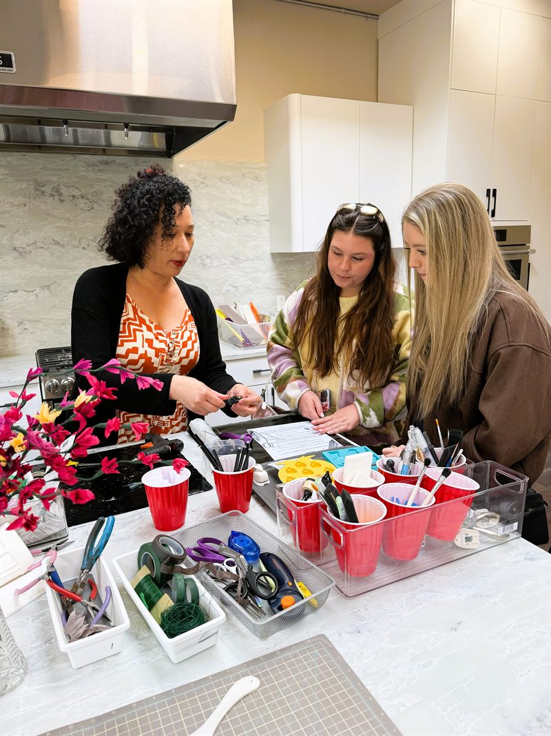 Guests crafting at the kitchen island
